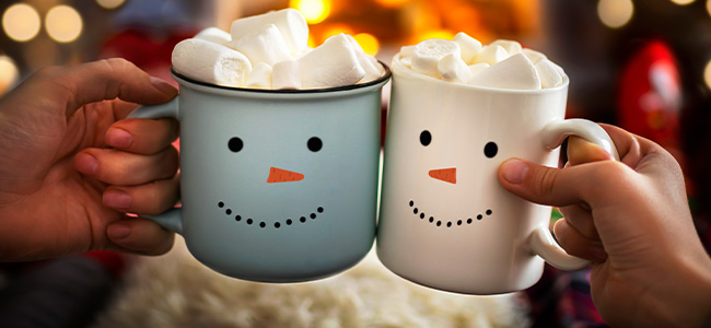Holiday Skip-A-Pay | ATFCU | Two mugs of hot chocolate with marshmellows