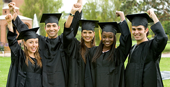 people in graduates uniform celebrating