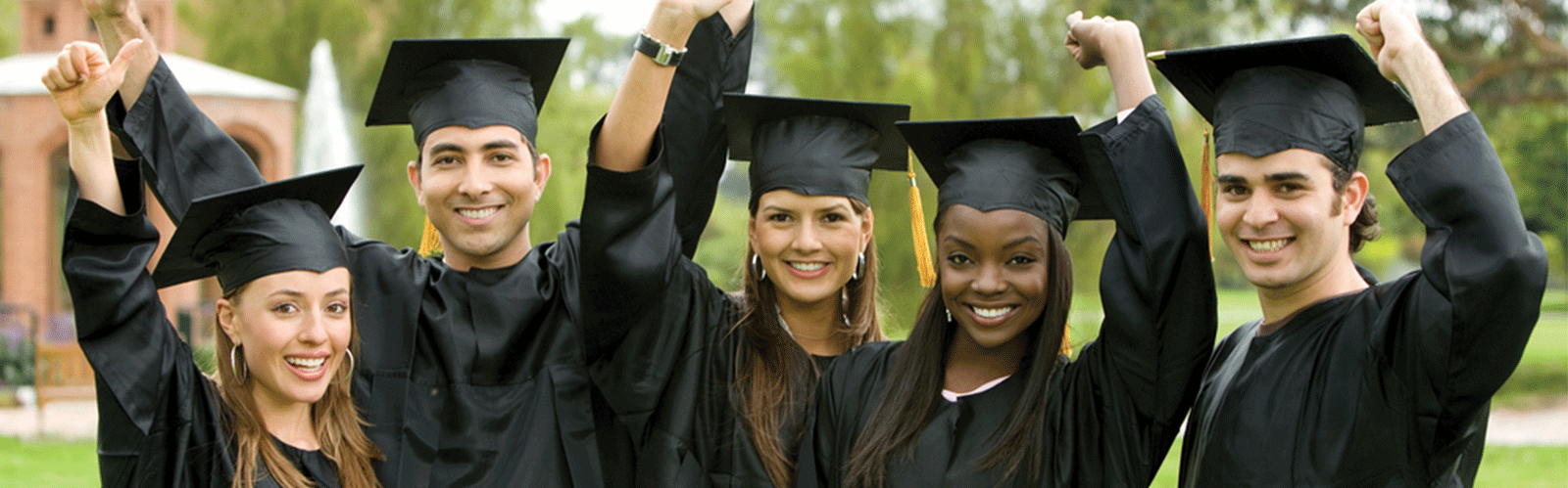 people in graduate uniform smiling and celebrating